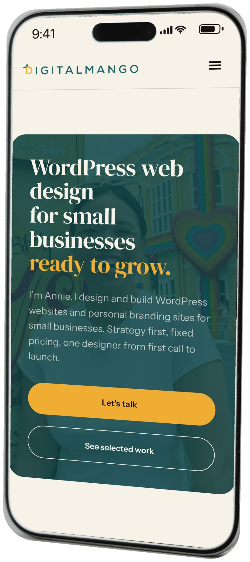 The Digital Mango homepage shown on a mobile phone